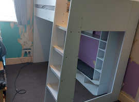 Cabin bed with storage shelves