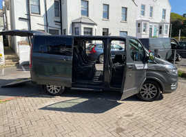 Wheelchair adapted vehicle with electric turney  seat