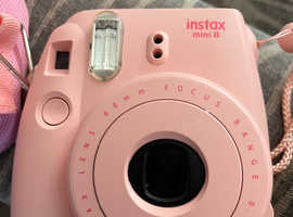 Pink instax 8 Polaroid camera
