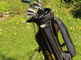 Golf set with trolly, bag and stand. Ideal for beginner.