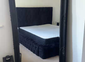 Black Victorian style mirror