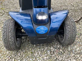 Large celebrity pride colt pursuit mobility scooter.
