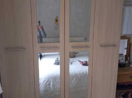 Double mirrored Light Oak wardrobes.