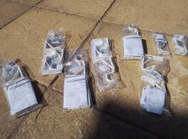 Bargain bucket, 14 curtain pole brackets, 160 shower curtain rings,