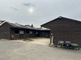 SOLE USE LIVERY YARD WITH 6 STABLES AND SCHOOL