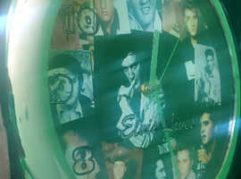 Elvis musical and talking wall clock