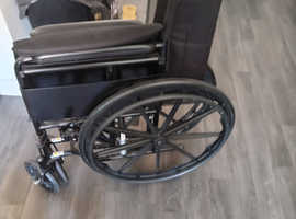Self. Propelled wheelchair