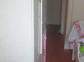Single bed and wardrobe