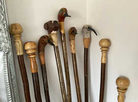 WOOD CARVED WALKING STICKS. WITH VARIOUS HEADS