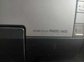 Epson printer suitable for photography plus lots of Epson paper.
