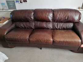 FREE Large brown leather sofs