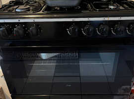 Duel cooker, gas hob, electric oven, black.