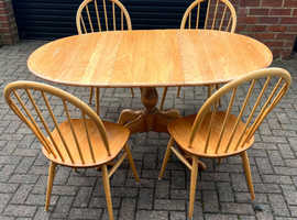 Ercol extending dining table and 4 Ercol Windsor chairs