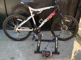 Apollo Paradox mountain bike and trainer