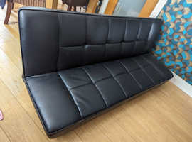 Faux leather sofa bed.