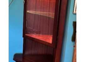 Corner display unit in mahogany with light and cupboard below