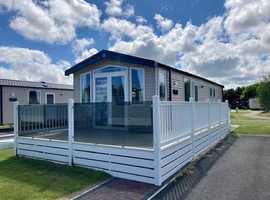 Luxury sited static caravan for sale with decking in Skegness Lincolnshire with free 2023 site fees
