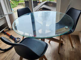 Solid oak and glass dining table and chairs