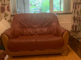 Nice terracotta 2 seater leather on oak sofa