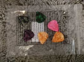 Electric guitar strings and picks