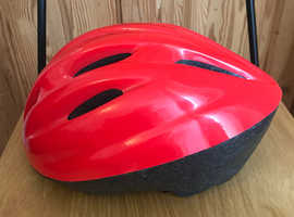 Red childrens bicycle helmet size M