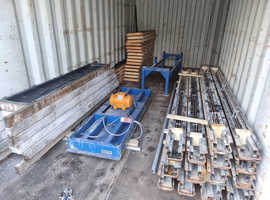 Concrete post and base moulds with vibrating table.