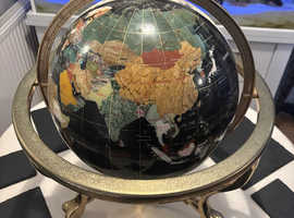 Globe with polished stones
