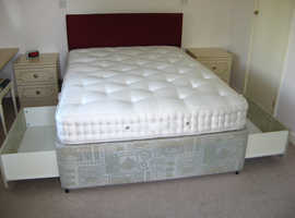 Double bed with storage in base.
