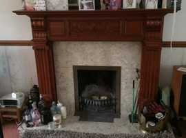 Marble fire surround, hearth, and grate