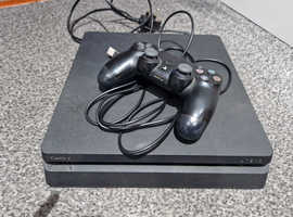PlayStation 4 slim with controller