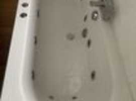 Jacuzzi bath with whirlpool spa jets