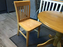 Solid wood round drop leaf table and 4 chairs