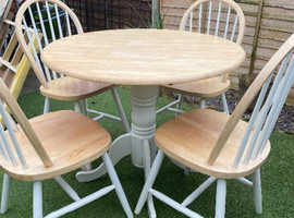 Solid pine  round kitchen table and 4 spindle back chairs