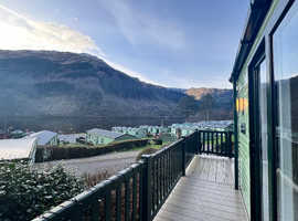 Holiday Home with Loch and Pine Forest views