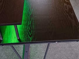 Desk with led and plug sockets