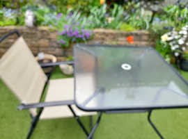 4 seater garden table and chairs, as new dark beige