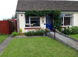 Small cosy Bungalow in lovely village non estate