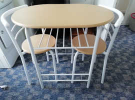 Small compact breakfast table and chairs