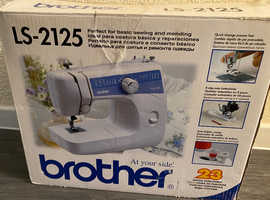 Sewing machine and small ironing board.