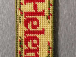 A Personalised Tapestry Bookmark with the name Helen.