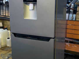 Fridge freezer with water dispenser can deliver
