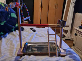 Bird play stand, tray and bowls with toys for sale.