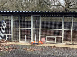 For sale 4 block of Wooden/metal kennels in good condition