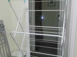 For sale a large extending clothes airer, in absolute as new condition.