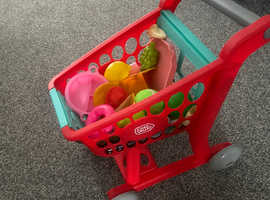 Kids play kitchen and fake foods and pots, shopping trolly and pans