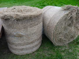 Round bale hay for sale.