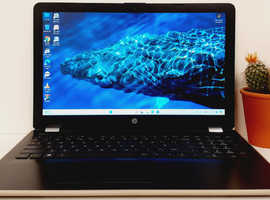 15'' HP Laptop, AMD A9, Windows 11, 8GB RAM & 256GB SSD, Microsoft Office installed.