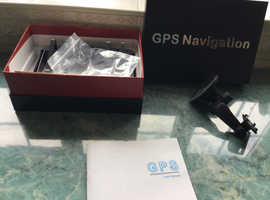 A GPS navigation sat nav , perfect order still with its original box.