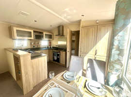 pre owned static caravan for sale. decking included full en suite and walk in wardrobe