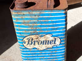 A collection of vintage metal tins.